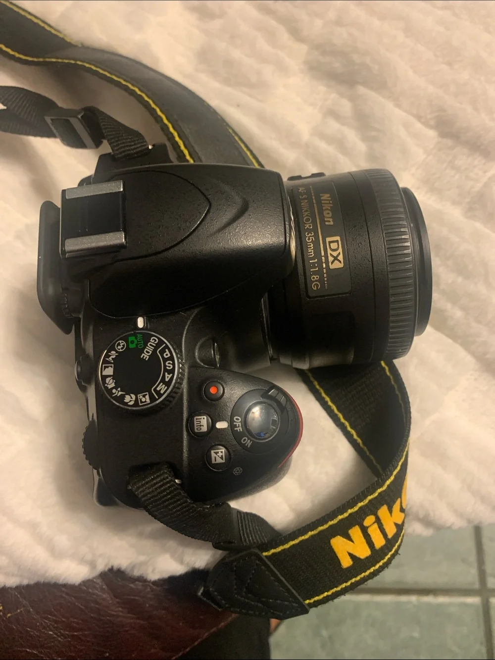 Nikon DSLR Camera in Black with Lens and Strap